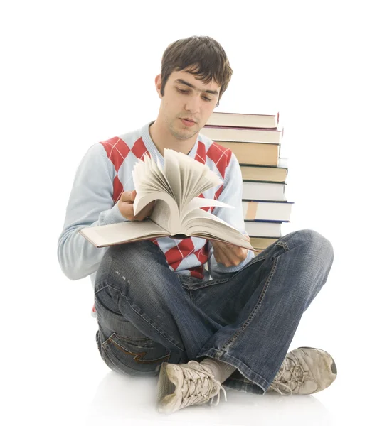 Der junge Student mit den Büchern lizenzfreie Stockfotos