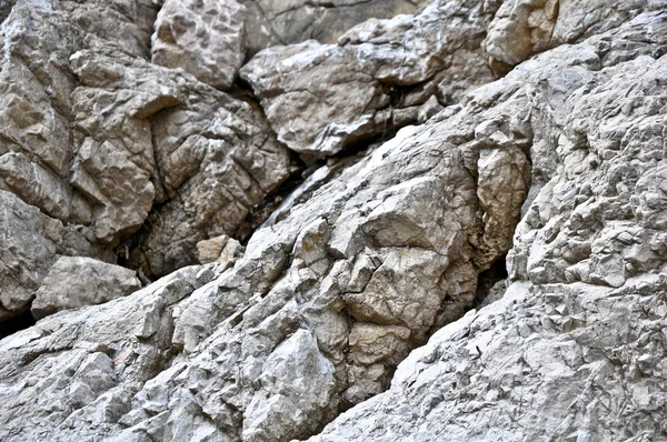 stock image Closeup grey stone with cracks