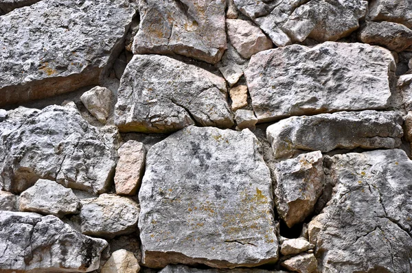 Struttura vicina di pietra con incrinature — Foto Stock