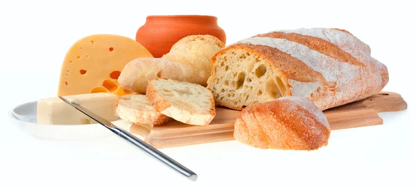 Stück Butter, Brot und ein Messer — Stockfoto