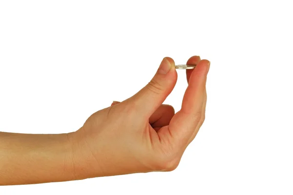 Dámská ruka drží mince — Stock fotografie