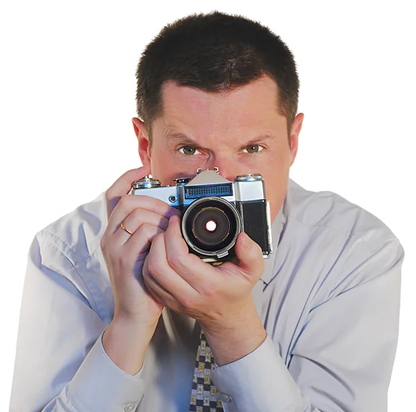 Человек со старой фотокамерой — стоковое фото