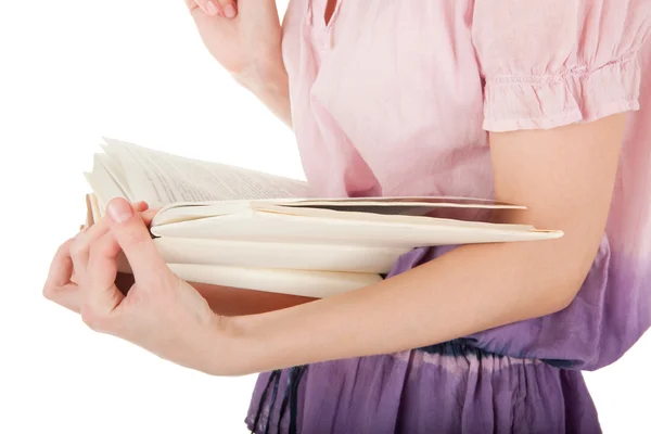 Mão de menina segurando um livro — Fotografia de Stock
