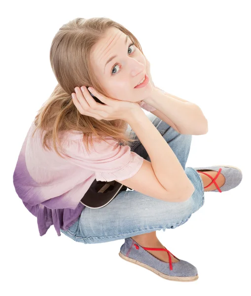 Νεαρό κορίτσι με ένα ακουστικά — Φωτογραφία Αρχείου