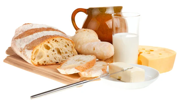 Stuk van boter, brood en een mes — Stockfoto