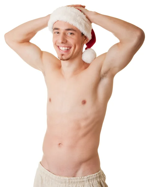 光秃的躯干和圣诞老人帽子的男人 — 图库照片
