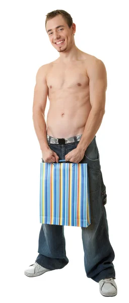 Young sportsman with gift bags — Stock Photo, Image