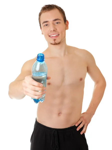 Sportsman with a bottle of clear liquid — Stock Photo, Image
