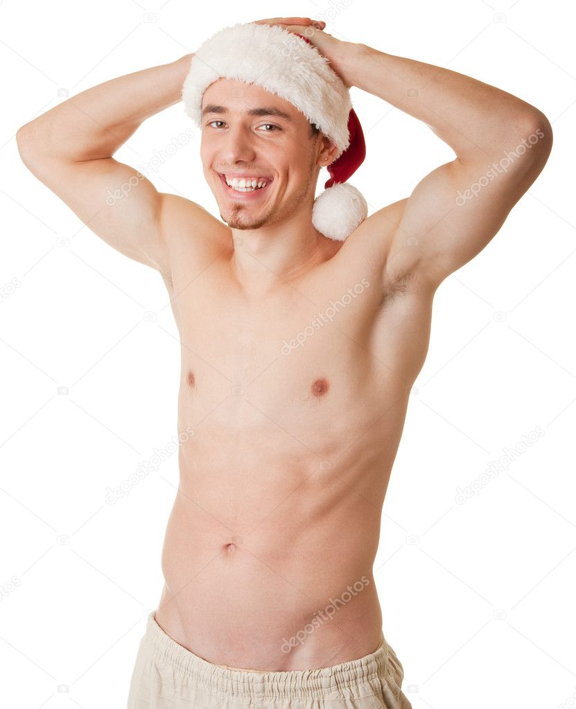 Man with a bare torso and Santa hat