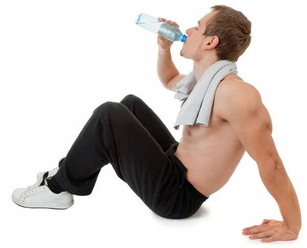 Young sportsman with a bottle — Stock Photo, Image