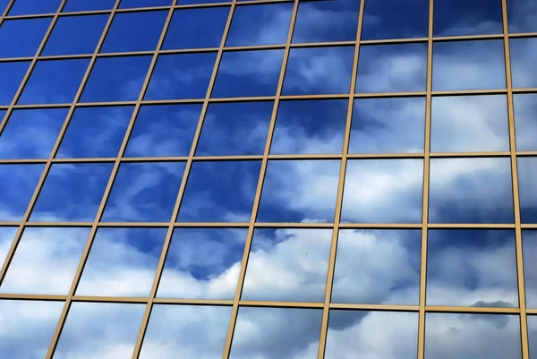 Mirror reflection of sky and clouds