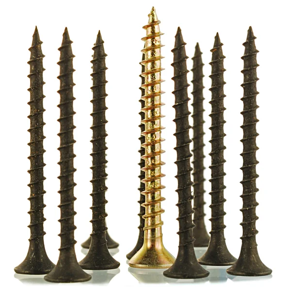 Black and brass angled screws — Stock Photo, Image