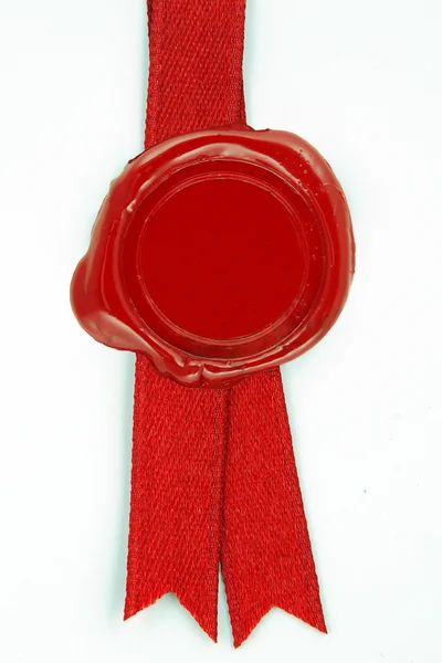 Červenou voskovou pečetí červenou stužku — Stock fotografie
