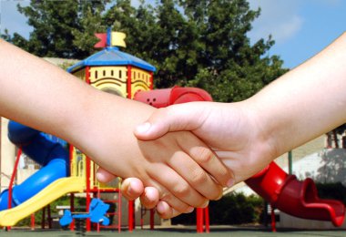 Children shaking hands clipart