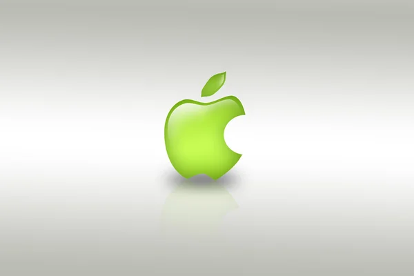 Зеленое яблоко с откушенным куском — стоковое фото