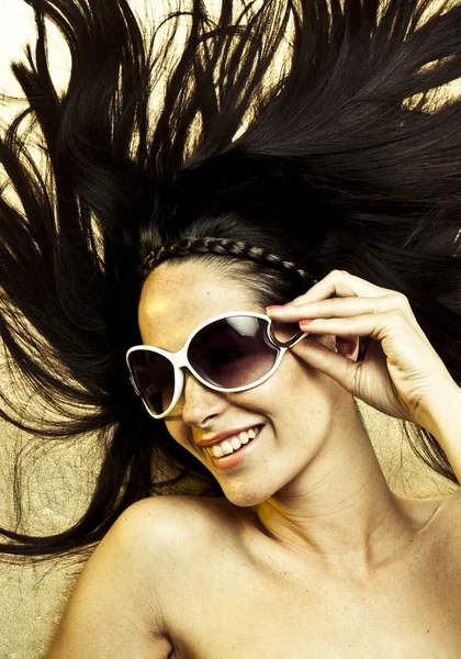 Gouden zonnebril — Stockfoto