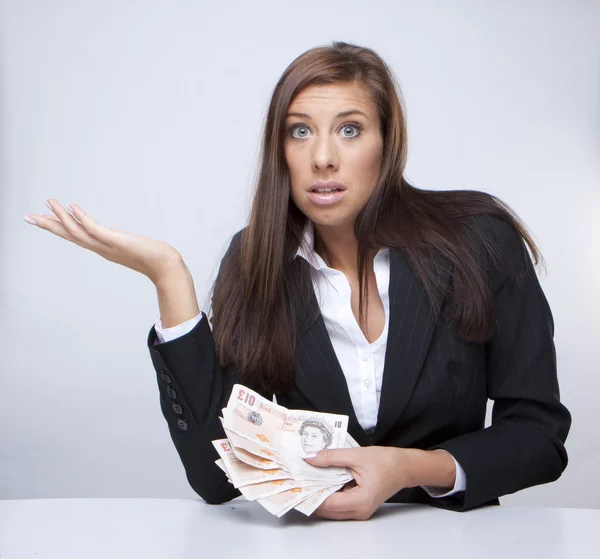 Businesswoman pulling money — Stock Photo, Image