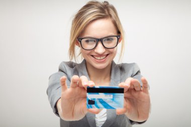 Woman holding new credit card