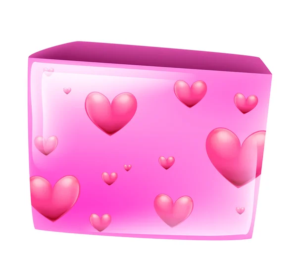 Красное сердце на розовой коробке — стоковое фото
