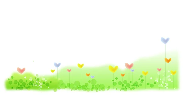 Flor de coração no gramado verde — Fotografia de Stock