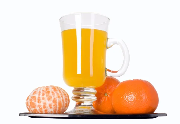 Mandarijn groenten en sinaasappelsap in glas — Stockfoto