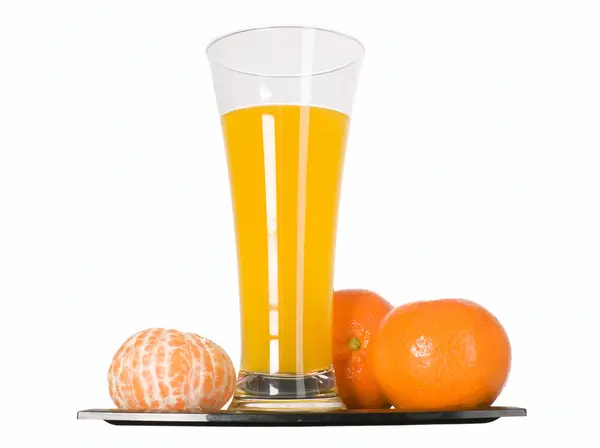 Mandarijn groenten en sinaasappelsap in glas — Stockfoto