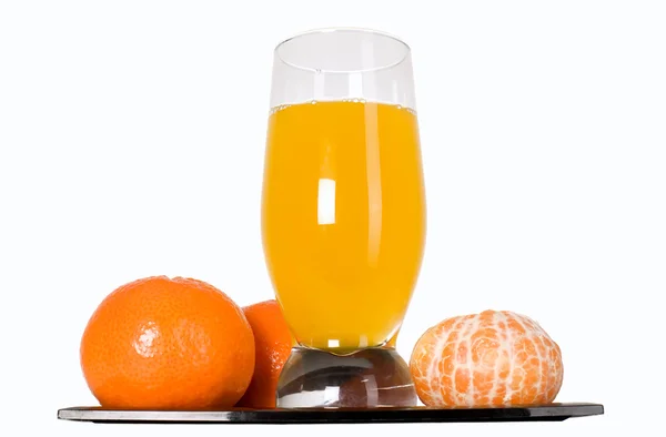 Fruta de mandarina y zumo de naranja en vaso — Foto de Stock