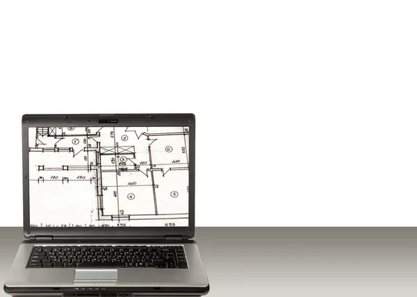 Laptop och hemma plan — Stockfoto