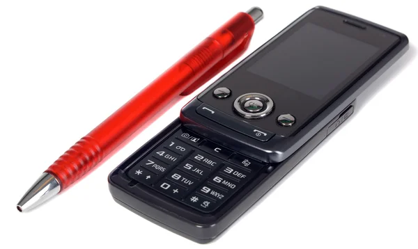 Preto moderno telefone móvel com caneta vermelha — Fotografia de Stock