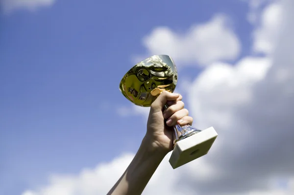 Man holding cup of winning — Stock Photo, Image