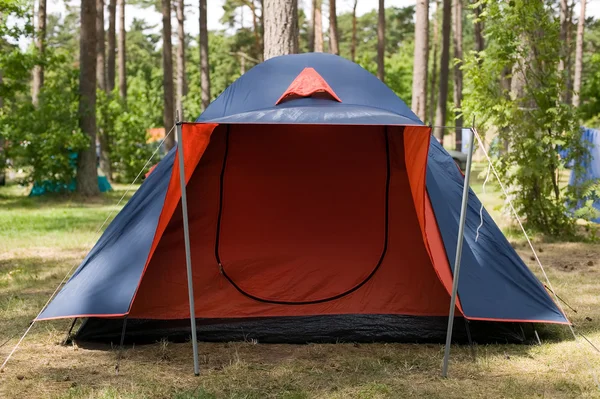 stock image Blue tent with red entrance