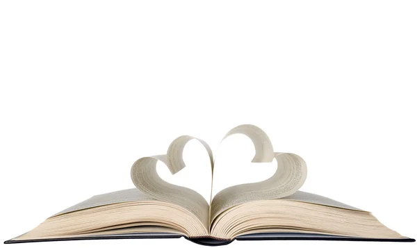 Otworzył książkę i kształt serca — Zdjęcie stockowe