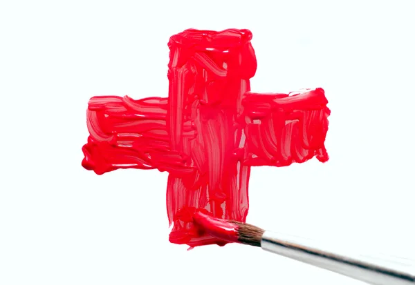 Cruz vermelha com escova — Fotografia de Stock