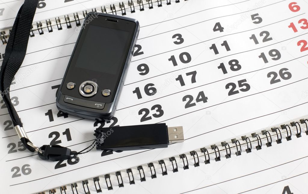 Mobile phone on the calendar — Stock Photo © carenas1 3312709