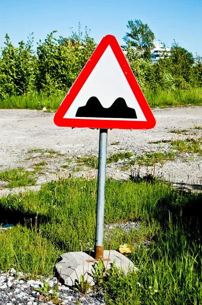 Dikkatle! yol pürüzlülüğü — Stok fotoğraf
