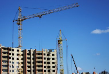 Building a house against the sky clipart