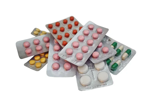 Tabletták fehér alapon — Stock Fotó