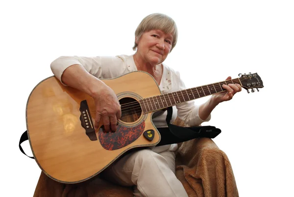 Volwassen vrouw akoestische gitaar spelen Rechtenvrije Stockafbeeldingen