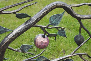 Metal forged branch with apple clipart
