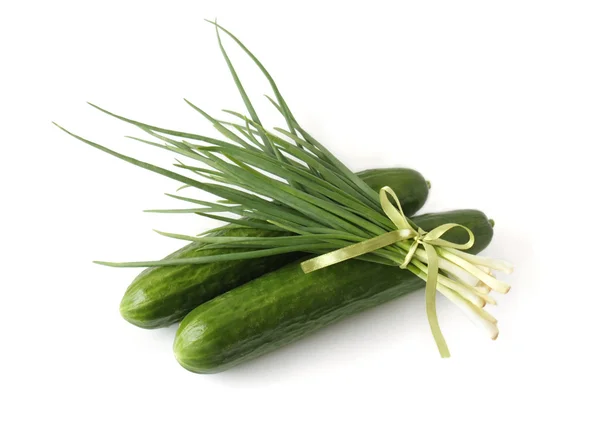 A bunch of green onions and cucumbers — Stock Photo, Image