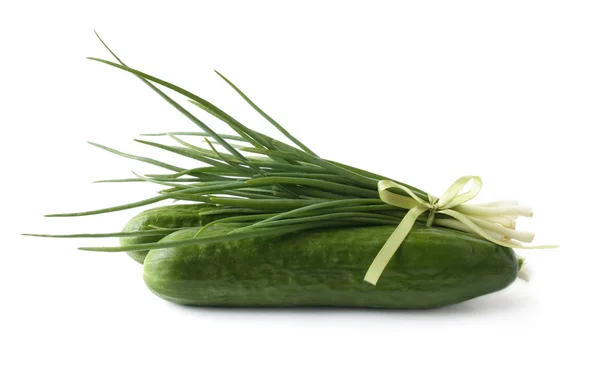 A bunch of green onions and cucumbers — Stock Photo, Image