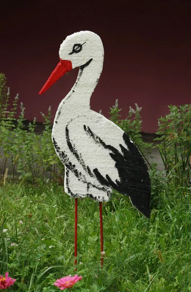 Foam stork on the lawn — Stock Photo, Image