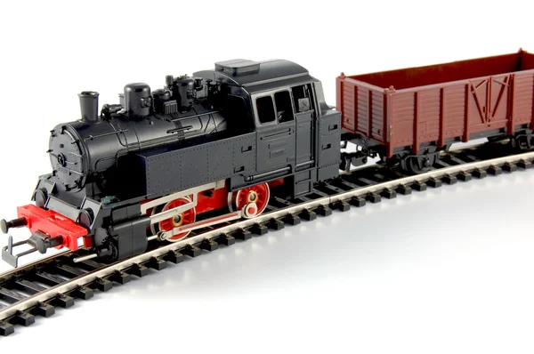 Spielzeug-Dampflok und Güterwagen — Stockfoto