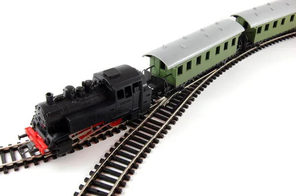 Trem a vapor de brinquedo e duas cabooses — Fotografia de Stock