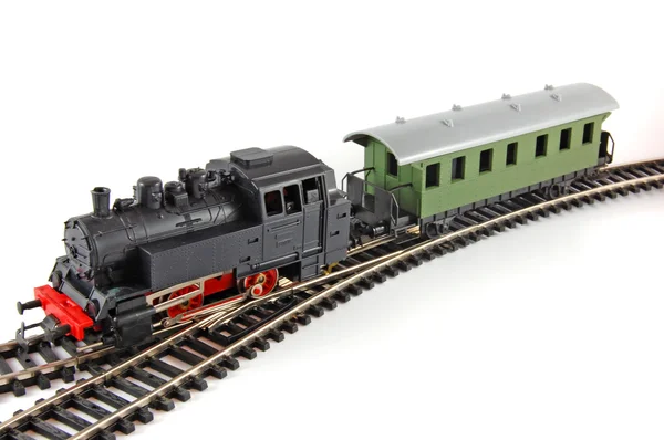 Trem a vapor de brinquedo e caboose — Fotografia de Stock