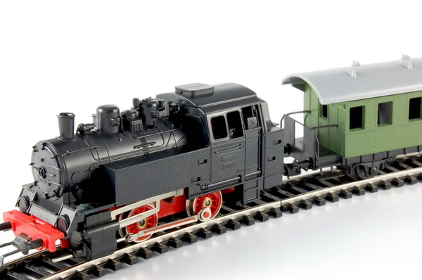 Trem a vapor de brinquedo e caboose — Fotografia de Stock