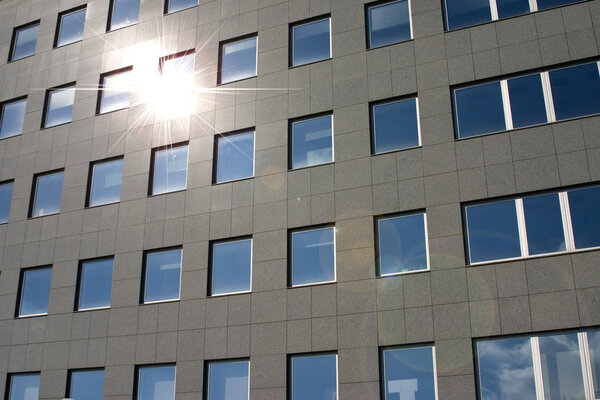 Sun reflection on front side of new building