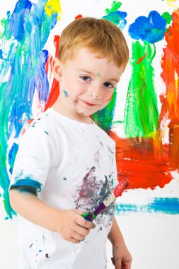 Child painting on wall clipart