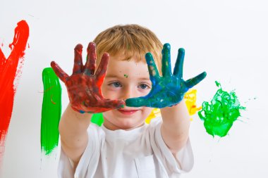 Child with painted hands clipart