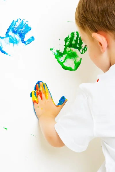 Criança pintura na parede — Fotografia de Stock